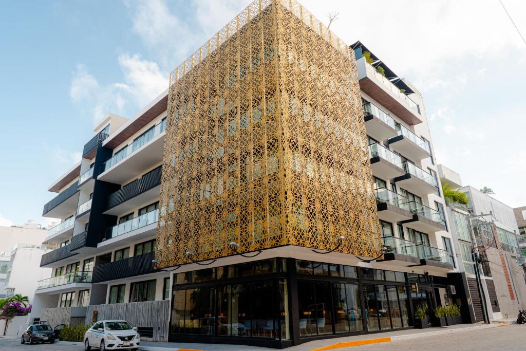 a building with a lot of lights on it at IT Boutique Hotel & Restaurant in Playa del Carmen
