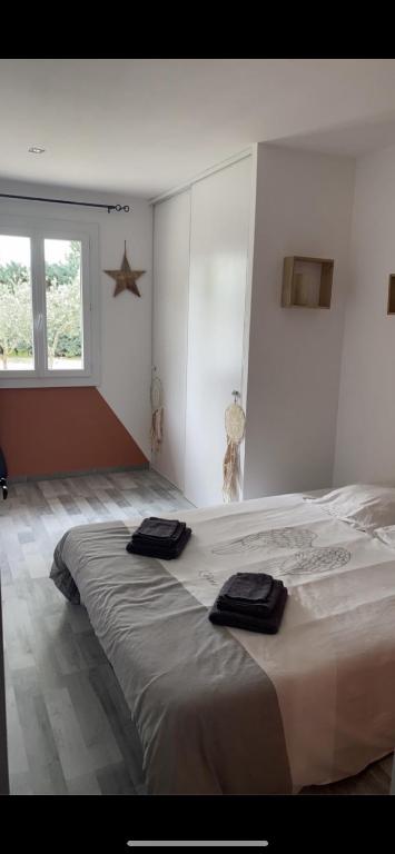 Ein Bett oder Betten in einem Zimmer der Unterkunft Villa pied du mont ventoux
