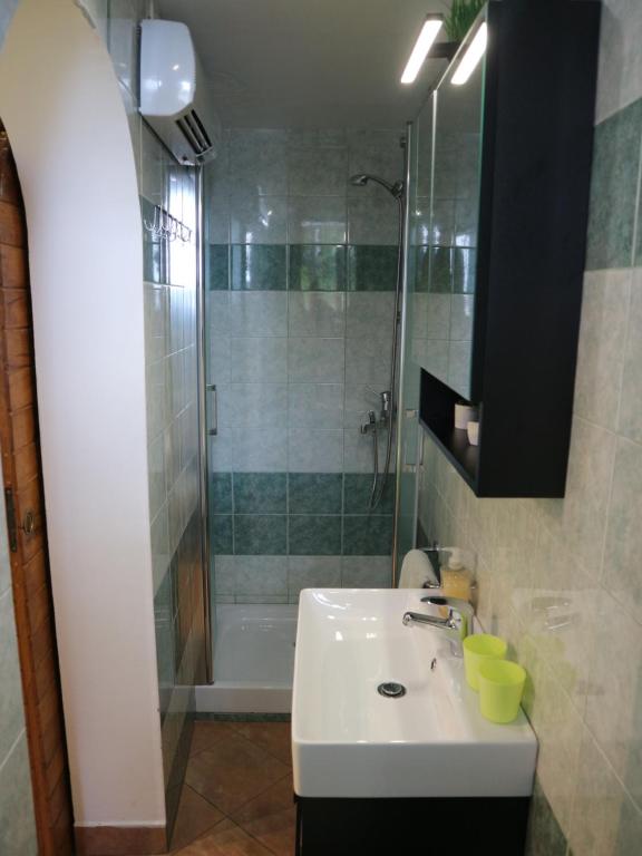 Kúpeľňa v ubytovaní Apartments Komel