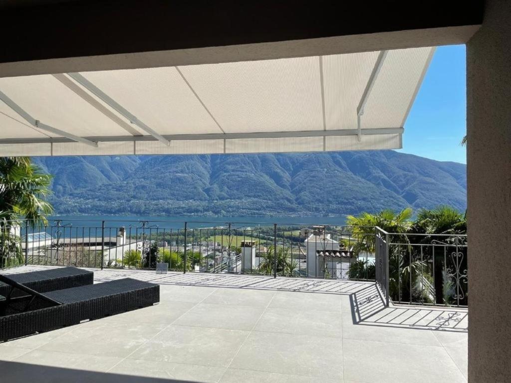 a patio with a view of a mountain at Casa Bijou in Monti della Trinità