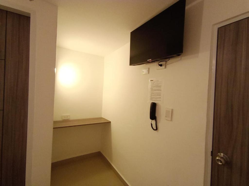 TV a/nebo společenská místnost v ubytování HOSPEDAJE SiLOM