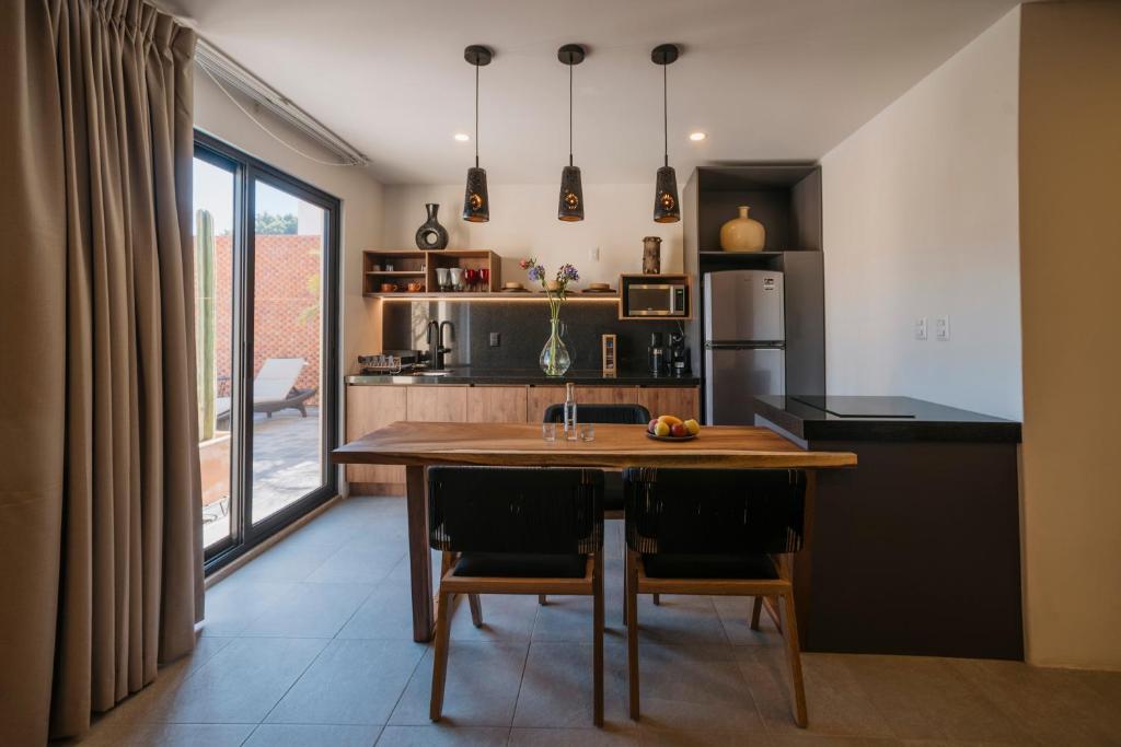 Kuchyň nebo kuchyňský kout v ubytování Punta Agave Suites