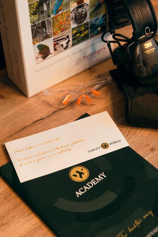 Certifikát, hodnocení, plakát nebo jiný dokument vystavený v ubytování TARGET WORLD Hunter's Lodge