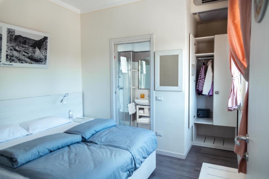 Voodi või voodid majutusasutuse Albergo Cristina toas