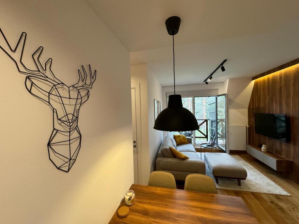 Katil atau katil-katil dalam bilik di Apartman Green Divčigora
