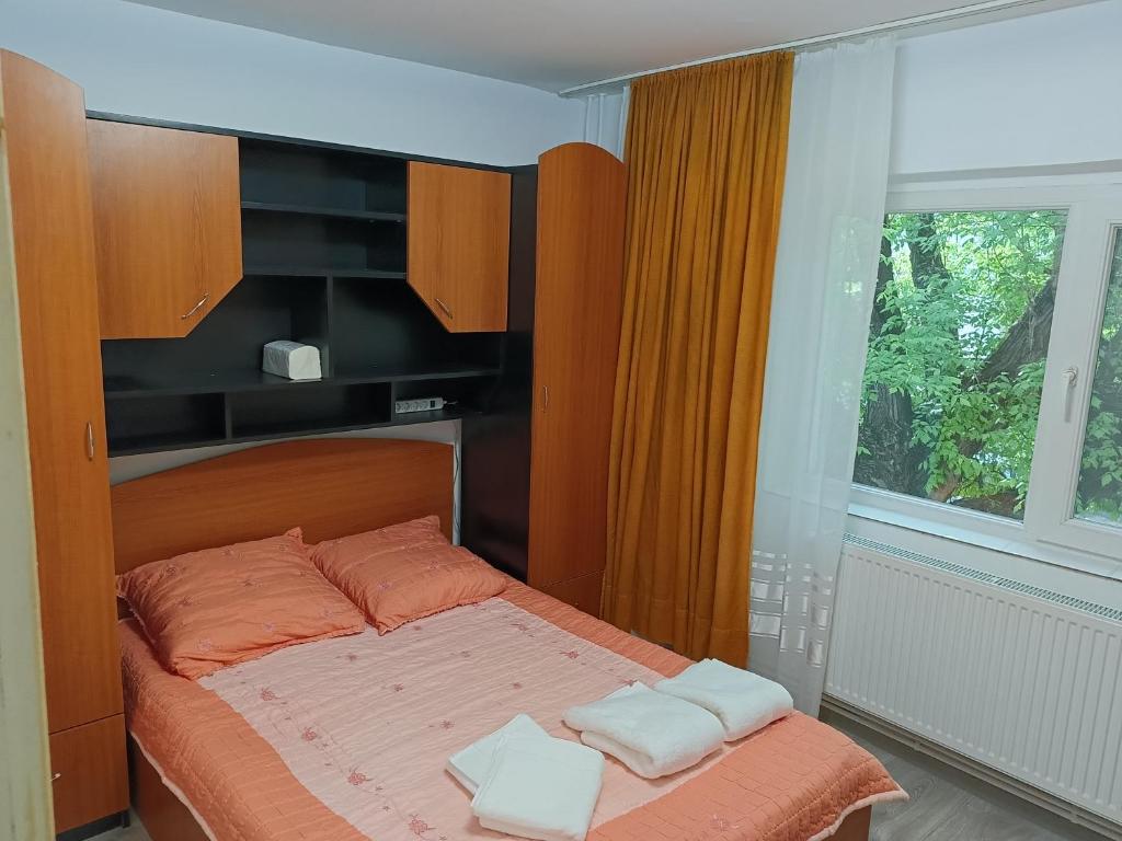 Кровать или кровати в номере Apartament 2 camere