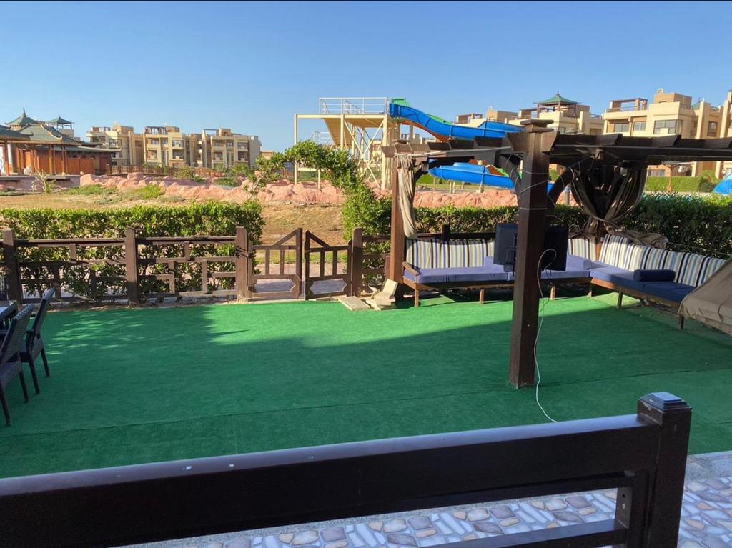 a play area with a playground with a slide at Marseilia blue bay asia in Ain Sokhna