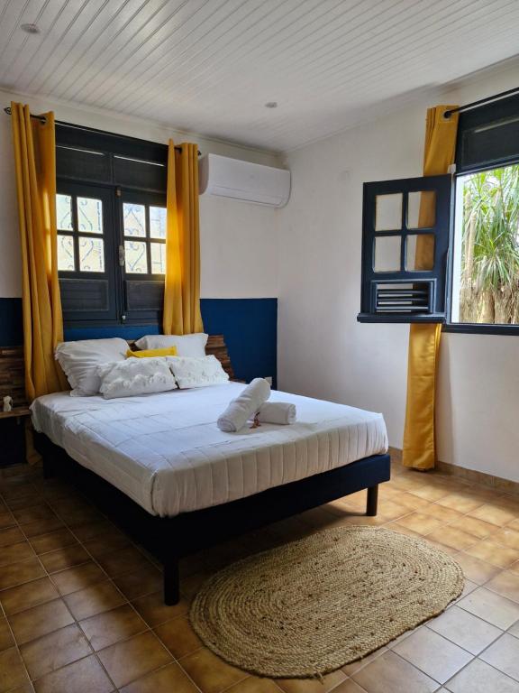 Postel nebo postele na pokoji v ubytování Villa Vénus