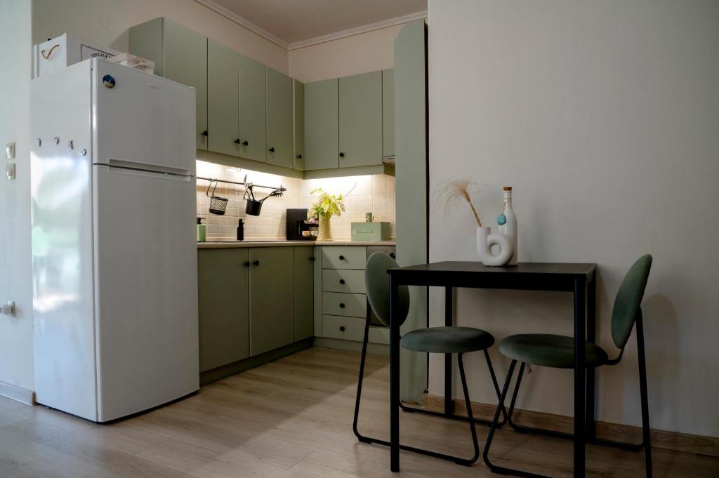 Kuchyň nebo kuchyňský kout v ubytování Sirmar Seaview Apartment