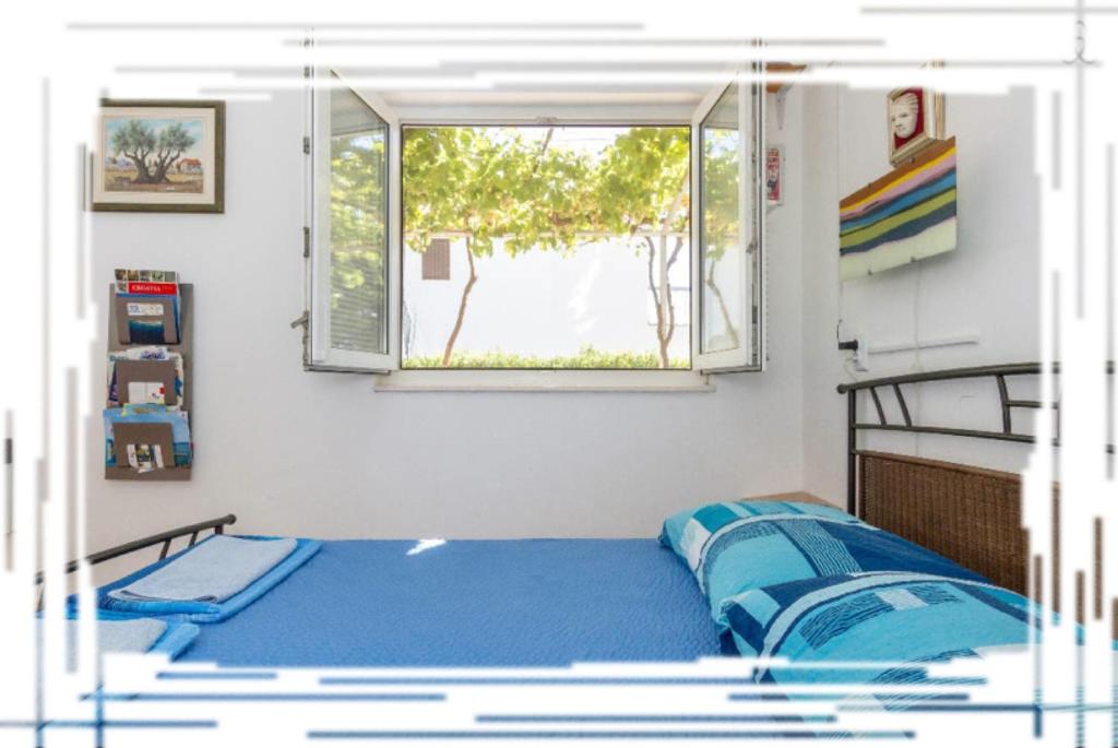 Postel nebo postele na pokoji v ubytování Hostel Oktarin