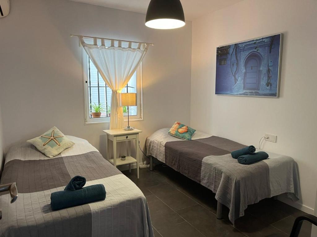 Postel nebo postele na pokoji v ubytování Casa Deniz