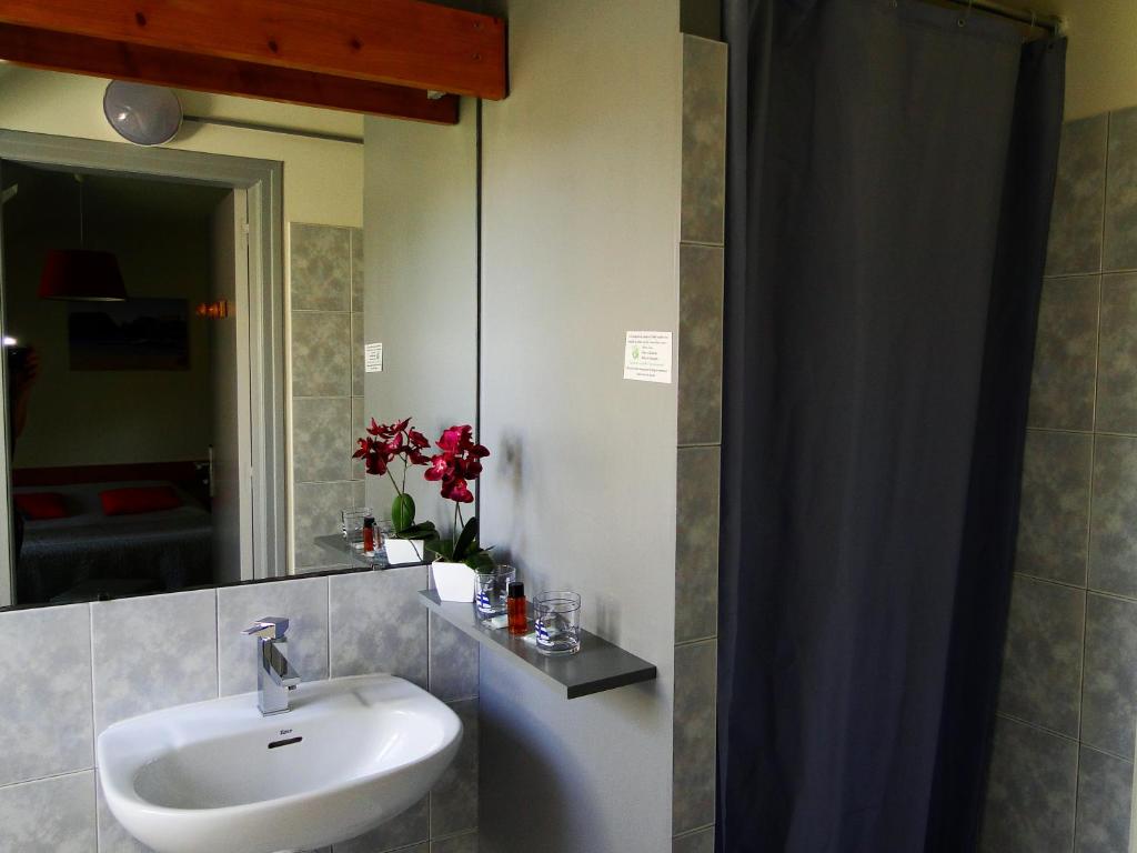 Koupelna v ubytování Hotel Aux Tamaris