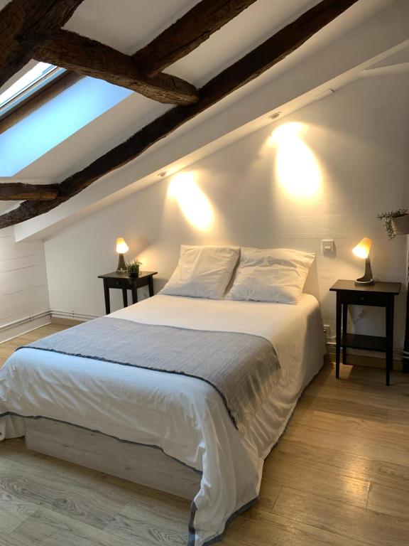 Llit o llits en una habitació de Bilbao Jardines
