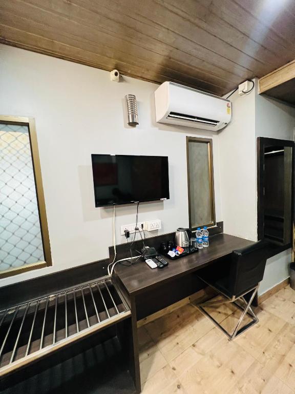 TV a/nebo společenská místnost v ubytování Hotel Sabera
