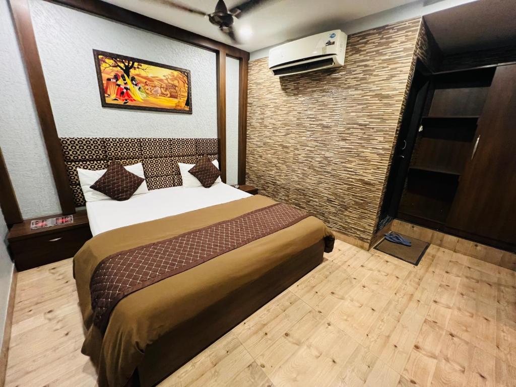 Postel nebo postele na pokoji v ubytování Hotel Sabera
