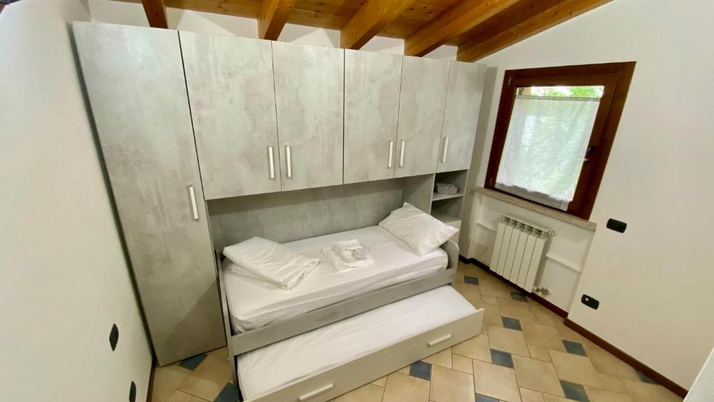 Postel nebo postele na pokoji v ubytování ENJOY HOUSE