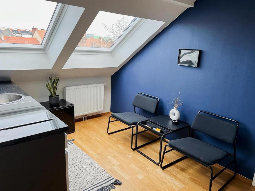 Posezení v ubytování Stilvolles City-Apartment