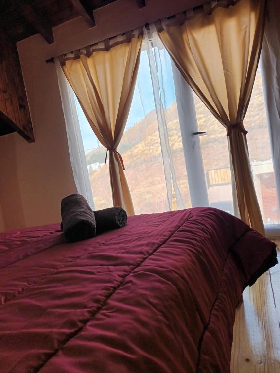 A bed or beds in a room at El sueño del flaco