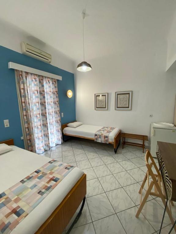 Postel nebo postele na pokoji v ubytování Thalia Hotel