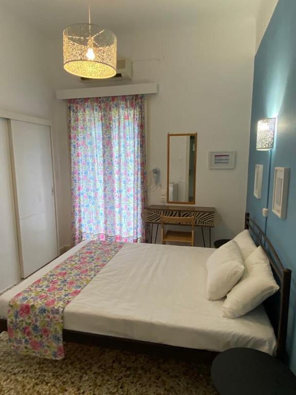Postel nebo postele na pokoji v ubytování Thalia Hotel