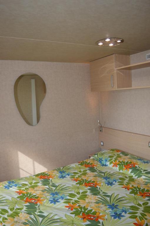 Postel nebo postele na pokoji v ubytování Camping Royal