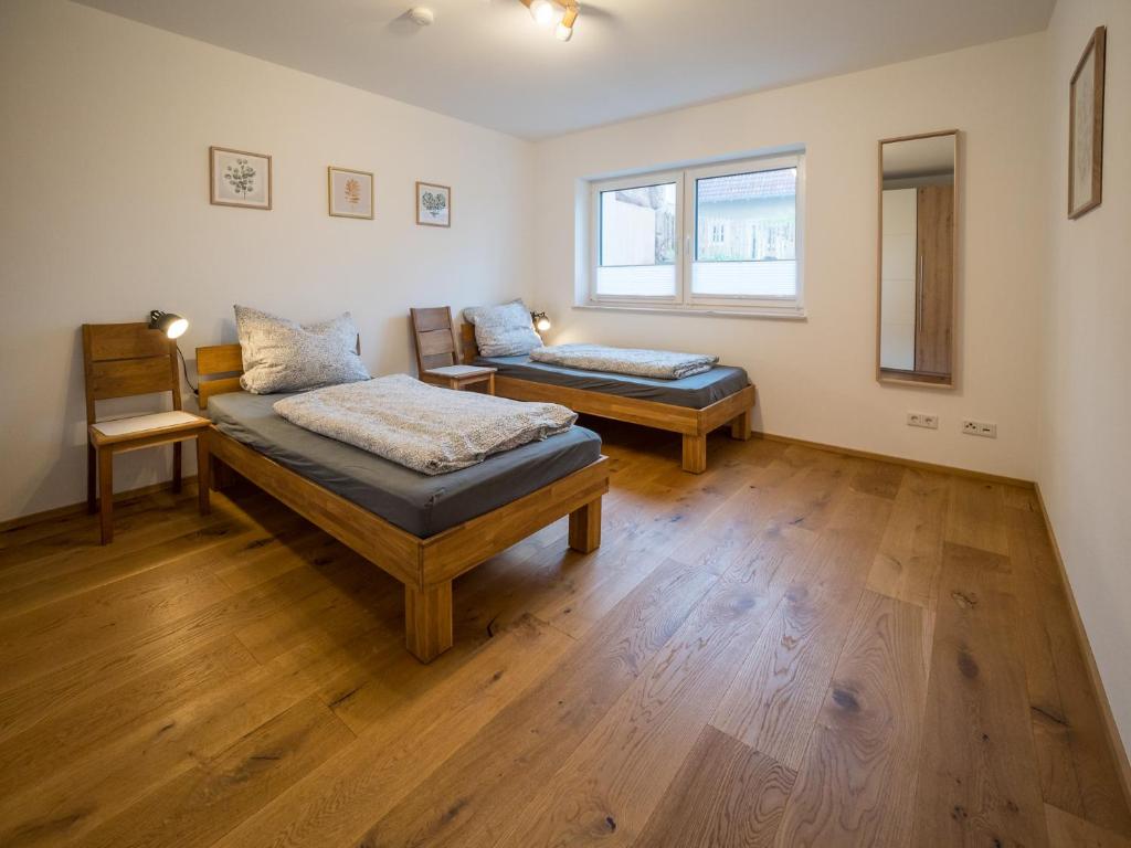 Postel nebo postele na pokoji v ubytování Ferienwohnung Winkler Abenberg
