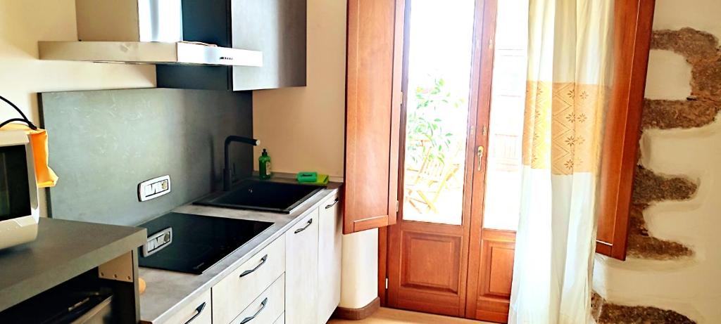 Kuchyň nebo kuchyňský kout v ubytování La Corte di Grazia_IUN P2039/40