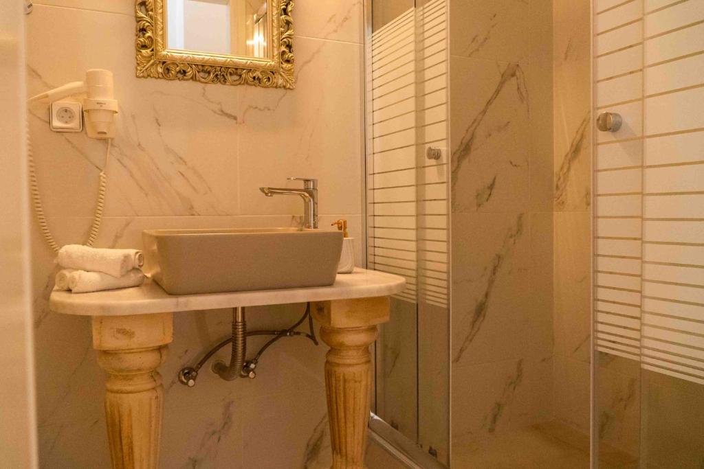Kúpeľňa v ubytovaní HELIADES SUITES