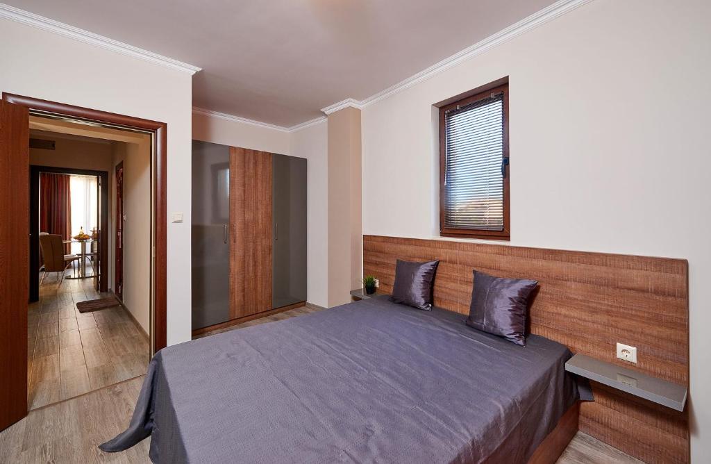 Postel nebo postele na pokoji v ubytování Bendita House
