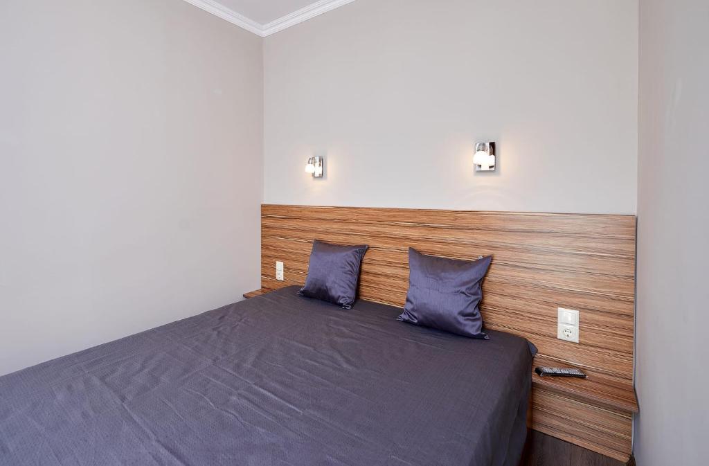Postel nebo postele na pokoji v ubytování Bendita House
