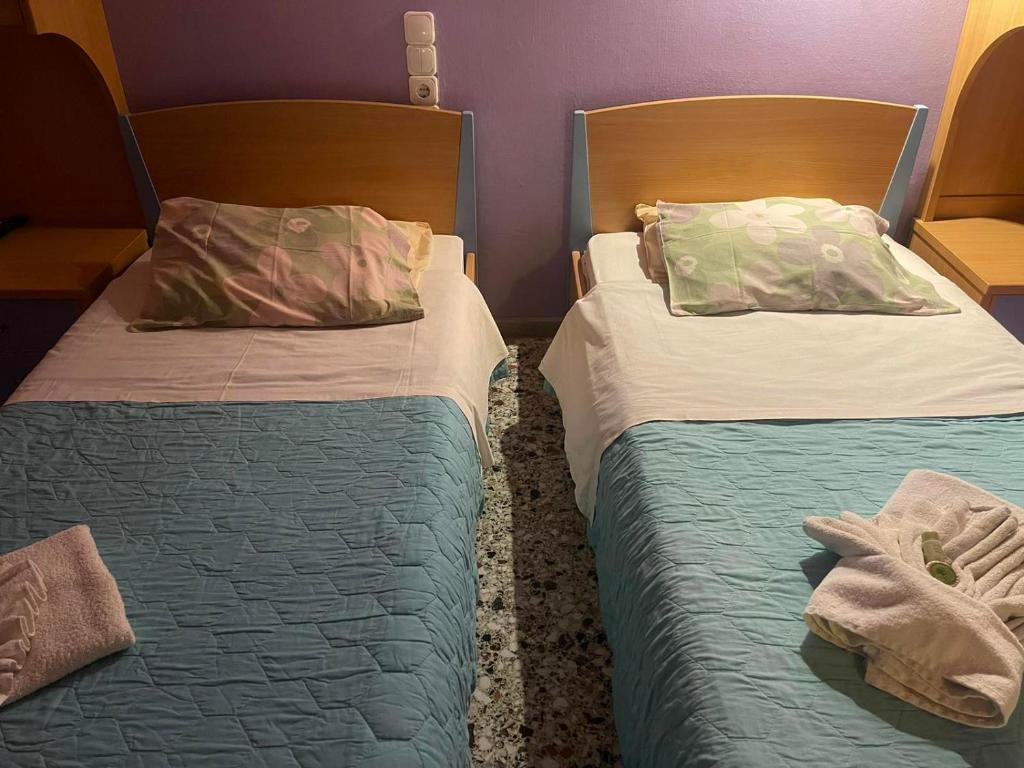 Postel nebo postele na pokoji v ubytování Pislis Rooms