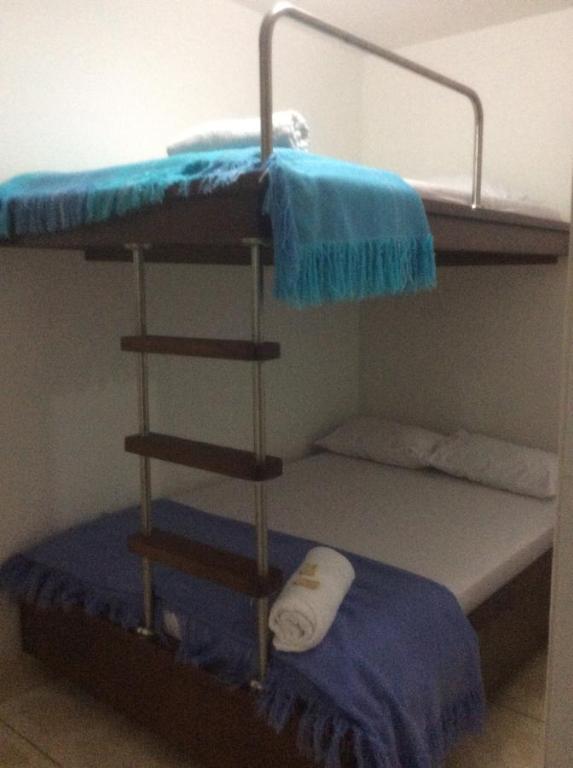 Postel nebo postele na pokoji v ubytování Hostal El Recreo
