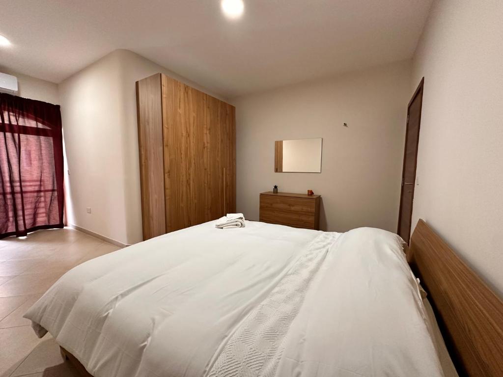 Voodi või voodid majutusasutuse Cliff Side Apartment toas