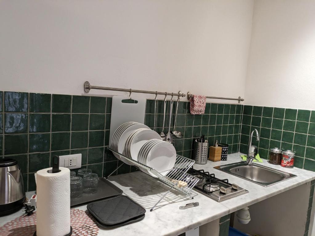 Kuchyňa alebo kuchynka v ubytovaní atocà3 casa vacanze - vedi anche atocà1 e atocà2