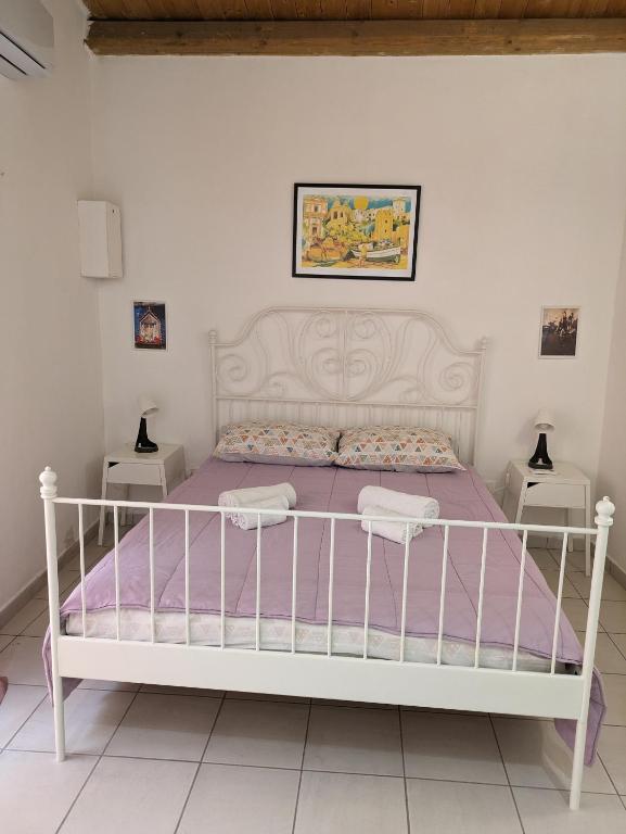 Posteľ alebo postele v izbe v ubytovaní atocà3 casa vacanze - vedi anche atocà1 e atocà2