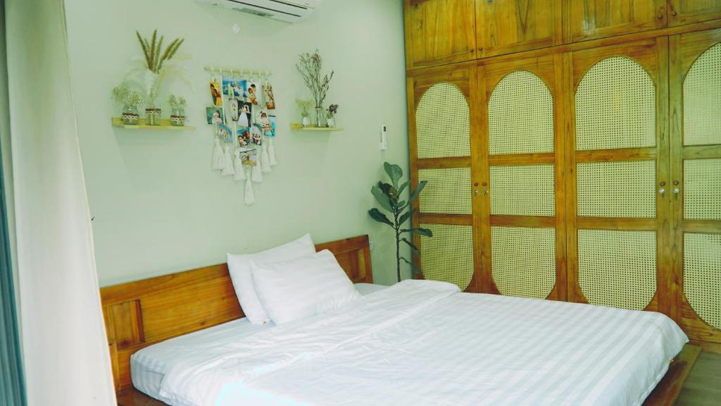 Postel nebo postele na pokoji v ubytování Dốc Chill - Villa gần Ba Vì, view núi, gần hồ, 40ph đi từ trung tâm Hà Nội