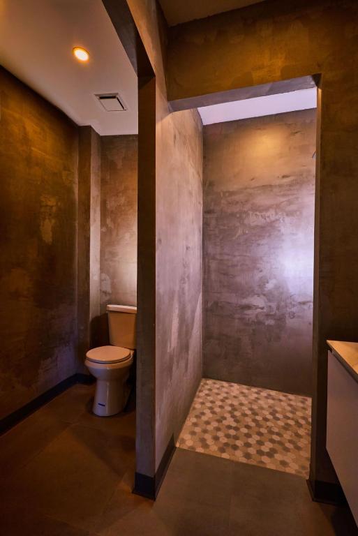 Koupelna v ubytování Ola Boutique Hotel