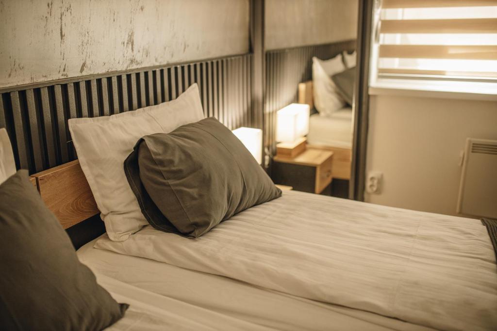 Postel nebo postele na pokoji v ubytování Apartman Premijer 1