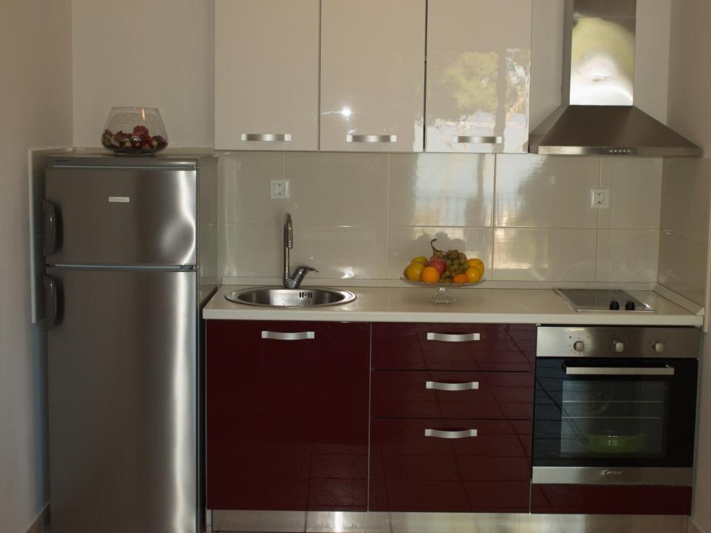 Kuchyň nebo kuchyňský kout v ubytování Apartments Barbara Sutivan