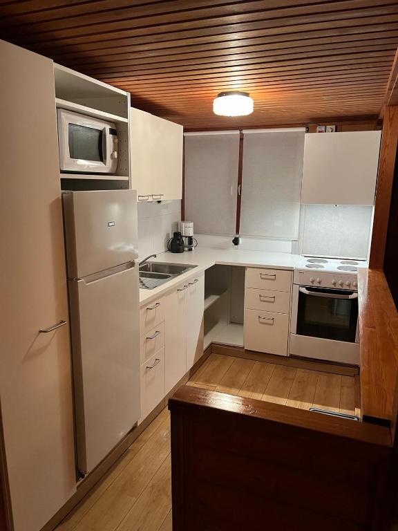 Kuchyň nebo kuchyňský kout v ubytování Chalet 182 La Boverie Rendeux - La Roche