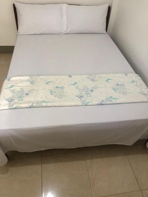 Postel nebo postele na pokoji v ubytování Diamond Lodging house