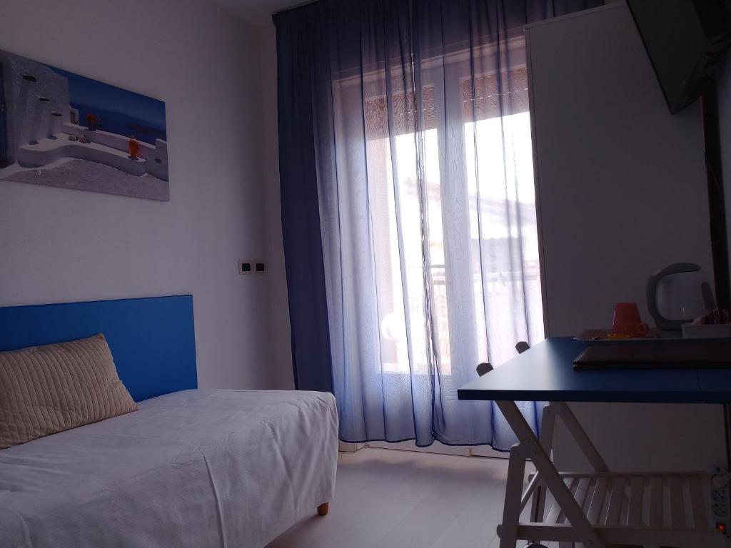 Postel nebo postele na pokoji v ubytování Hotel Eliani