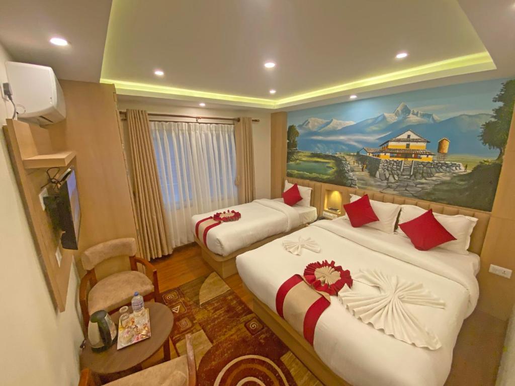 Postel nebo postele na pokoji v ubytování Hotel Malati