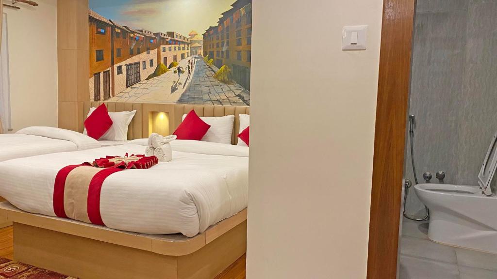 Postel nebo postele na pokoji v ubytování Hotel Malati