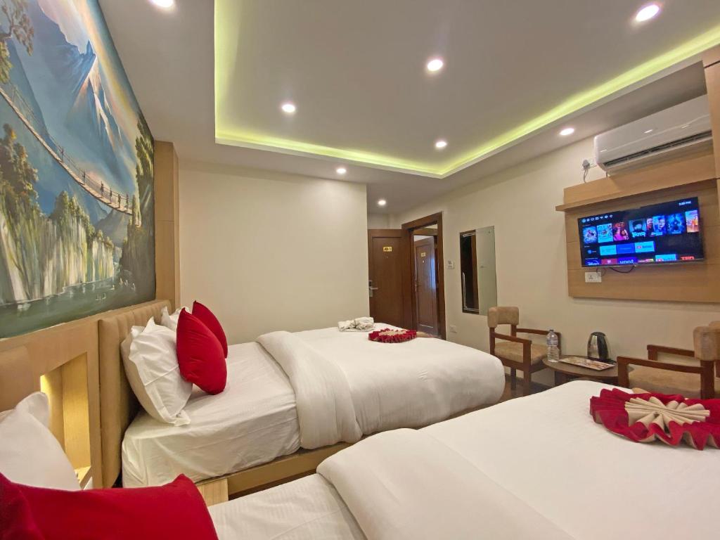 Postel nebo postele na pokoji v ubytování Hotel Malati