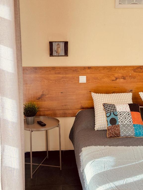 Postel nebo postele na pokoji v ubytování Hôtel le Nid