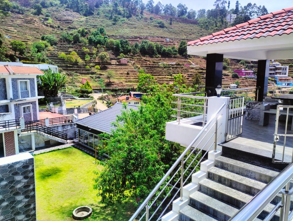 a view from the balcony of a house at REGALIA ROOMS KODAI in Kodaikānāl