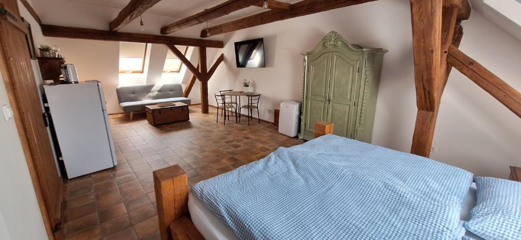 Postel nebo postele na pokoji v ubytování Apartmány Ve starém pivovaru