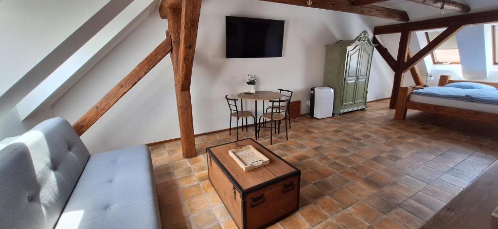 Postel nebo postele na pokoji v ubytování Apartmány Ve starém pivovaru