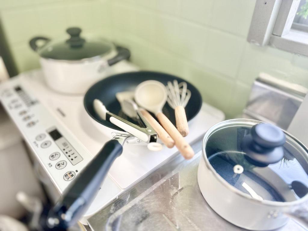 Fufu House Tokyo Shin-Okuboにあるキッチンまたは簡易キッチン